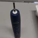 Philips Sonicare 6500 Series Electric Toothbrush - Next-Generation Sonicare Technology, Pressure Sensor, 9 Brushing Settings, SmarTimer, BrushPacer, 21-Day Runtime, Travel Case, Navy Blue, HX7413/07