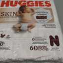 Huggies Size Newborn Diapers, Skin Essentials Baby Diapers, Size Newborn (6-9 lbs), 180 Count (3 Packs of 60)