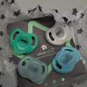 Tommee Tippee Ultra-Light Silicone Pacifier, 0-6 Months, Symmetrical One-Piece Design, BPA-Free Silicone Binkies, Clear/Blue/Green, Pack of 4