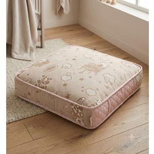 cushioned floor pillow featuring a beautifully textured beige jacquard weave
