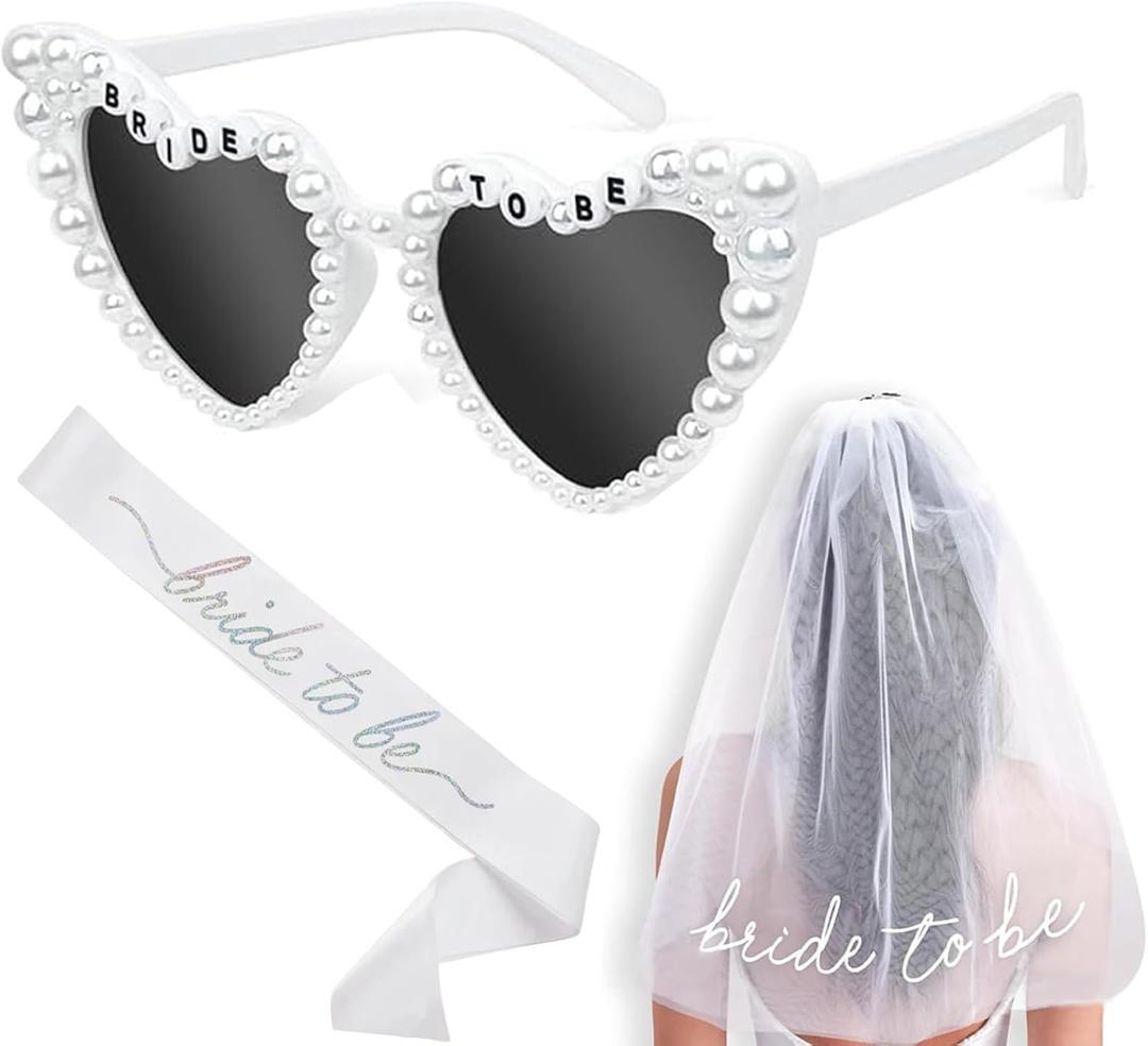 JoyChoi Bachelorette Party Accessories for Bride  3-Piece Kit with Heart Sunglasses, Bride Sash & Veil  Cute Bridal Shower Decorations & Engagement or Wedding Gift Set for Women