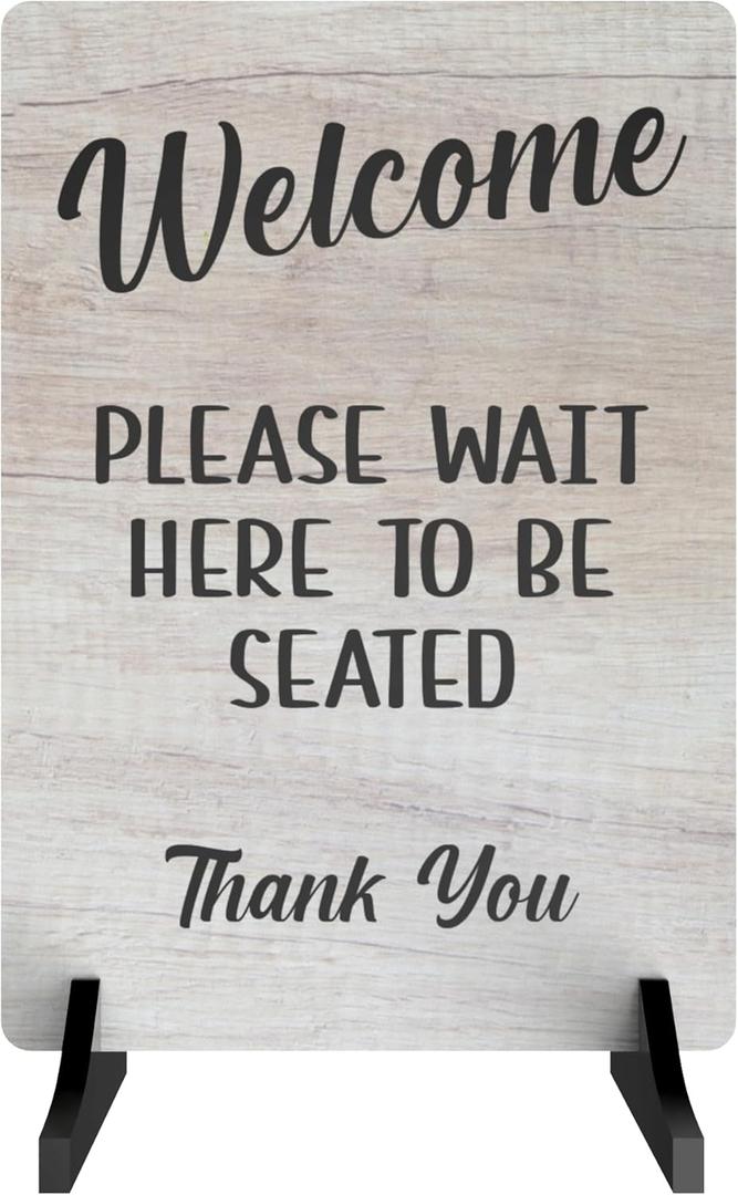 Please Wait Here To Be Seated Sign - Also as Freestanding or Adhesive Sign, ideal for cafes, restaurants or pubs (White Wood Effect Acrylic Stand)