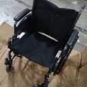 Medline Durable Steel Wheelchair for Elderly and Disabled, Flip-Back Desk-Length Arms, Elevated Leg Rests, 20-Inch Wide Seat, 300-Ib weight capacity, Black