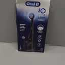 OralB Rechargeable Electric Toothbrush, iO2 Starter Kit, 3 Cleaning Modes, Automatic Pressure Sensor to Protect Gums, 2 Brush Heads, Night Black