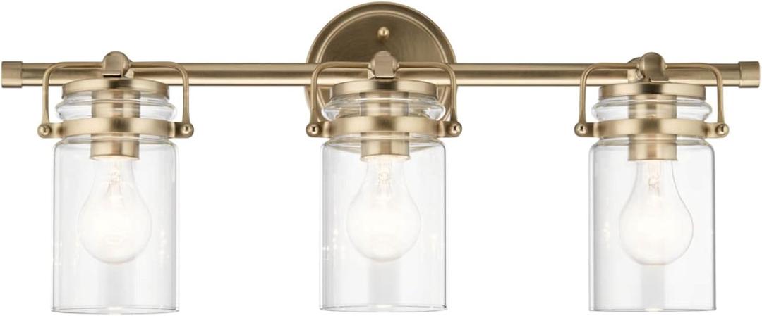 Kichler, Brinley 24" 3 Light Vanity Light with Clear Glass in Champagne Bronze for Bathroom and Powder Room, (24" W x 10.25" H), 45689CPZ
