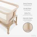 Evolur Lullaby Portable Bassinet with Wheels, Adjustable Bedside Sleeper, Breathable Mesh Sides, Large Storage Basket, Easy Fold, and Travel Bag Included, Perfect for Newborns & Infants - Biege