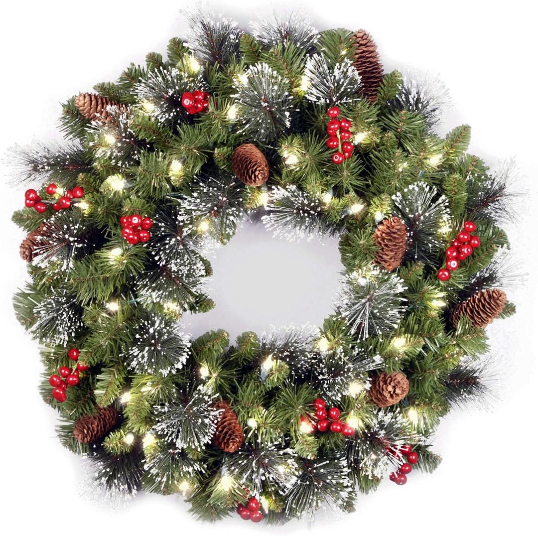 National Tree Company 24 in Pre-Lit Crestwood Spruce Artificial Christmas Wreath, Christmas Decoration with Glitter, Pinecones, Red Berries, 50 Clear LED Lights, 160 Tips, Timer, Green