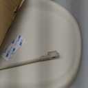 Skip Hop Baby Changing Pad Nursery Style Wipe-Clean Contoured with Cushioned Foam, Non-Skid Base, Built-in Safety Belt & Tuck-Away Toy Bar, Oat