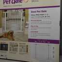 MidWest Homes for Pets 29 Inches Tall Walk-Though Steel Pet Gate, Pressure Mounted Dog Gate with Glow Strip Measures 29H x 29.5-38W Inches & Includes Two 3-Inch-Wide Extensions, White