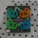 Tommee Tippee Ultra-Light Silicone Pacifier, 18-36 Months, Symmetrical One-Piece Design, BPA-Free Silicone Binkies, Blue/Orange/Green, Pack of 4