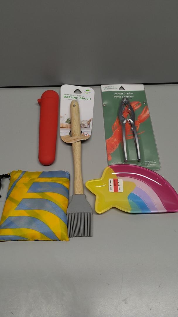 Red inflatable kneeling cushion / garden kneeler

Wooden-handled hand rake (with metal tines)

Pruning shears (in packaging)

Yellow and blue striped cushion/pillow

Star-shaped tray/scoop with rainbow design