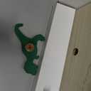 The Big One Bright Dino 4-Hook Wall Decor