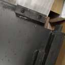 Signature Design by Ashley Aldwin Farmhouse Square End Table with Crossbuk Details, Light Brown