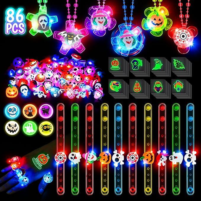 86 PCS Halloween Party Favors for Kids, Glow in the Dark Halloween Toys Bulk Rotating Spin Light Up Necklaces LED Rings Bracelets Bouncing Ball Temporary Tattoos for Halloween Goodie Bag Stuffers