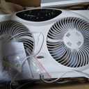 Bionaire Window Fan with Reversible Airflow Blades 3-Speed Settings, Programmable Thermostat, LED Display, Remote Control, Fits 2436" Windows, No Assembly Required