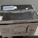 Nostalgia Countertop Microwave Oven with Easy Clean Interior- Retro Microwave with LED Display & Child Lock- Compact 0.7 Cu Ft Oven With 12 Pre-Programmed Settings for any kitchen- 700-Watts- Lavender