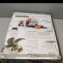 MidWest Homes for Pets Small Wabbitat Rabbit Cage, Grid Mesh Floor, Removable Tray, Top & Front Door Access, Rust Resistant Finish, No Tools Required (25.0"L x 19.0"W x 20.0"H, Black)