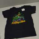 Kids St Patricks Day 2026 - Dinosaur Riding Monster Truck T-Shirt 4T