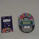 Educational Insights Wheel of Fortune Game - Handheld Electronic Game, Great for Travel, Classic Retro Party Games for Kids, Teens & Adults, Word Puzzle Challenge & Entertaining Gift for Ages 8+
