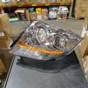 Dorman Driver Side Headlight Assembly Compatible with Select Cadillac Models