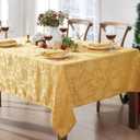 Newbridge Christmas Carol Holiday Noel Damask Fabric Tablecloth, 60 x 84 Inch Rectangle, Gold, Holly Leaf Poinsettia Weave, Wrinkle Free Soil Resistant Easy Care Table Cover