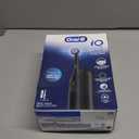 Oral-B Rechargeable Electric Toothbrush, iO Limited Simple Clean, 3 Cleaning Modes, Automatic Pressure Sensor to Protect Gums, Travel Case, Night Black (1 Count (Pack of 1))