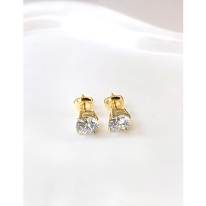 Pair of laboratory-grown diamond stud earrings with two round brilliant cut stones, total carat weight approximately 1.00 ct, color G–H, clarity VS1–VS2. Includes laboratory jewelry report dated December 28, 2024