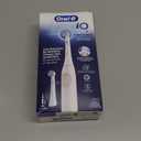 Oral-B Rechargeable Electric Toothbrush, iO2 Starter Kit, 3 Cleaning Modes, Automatic Pressure Sensor to Protect Gums, 2 Brush Heads, Pure White (1 Count (Pack of 1))