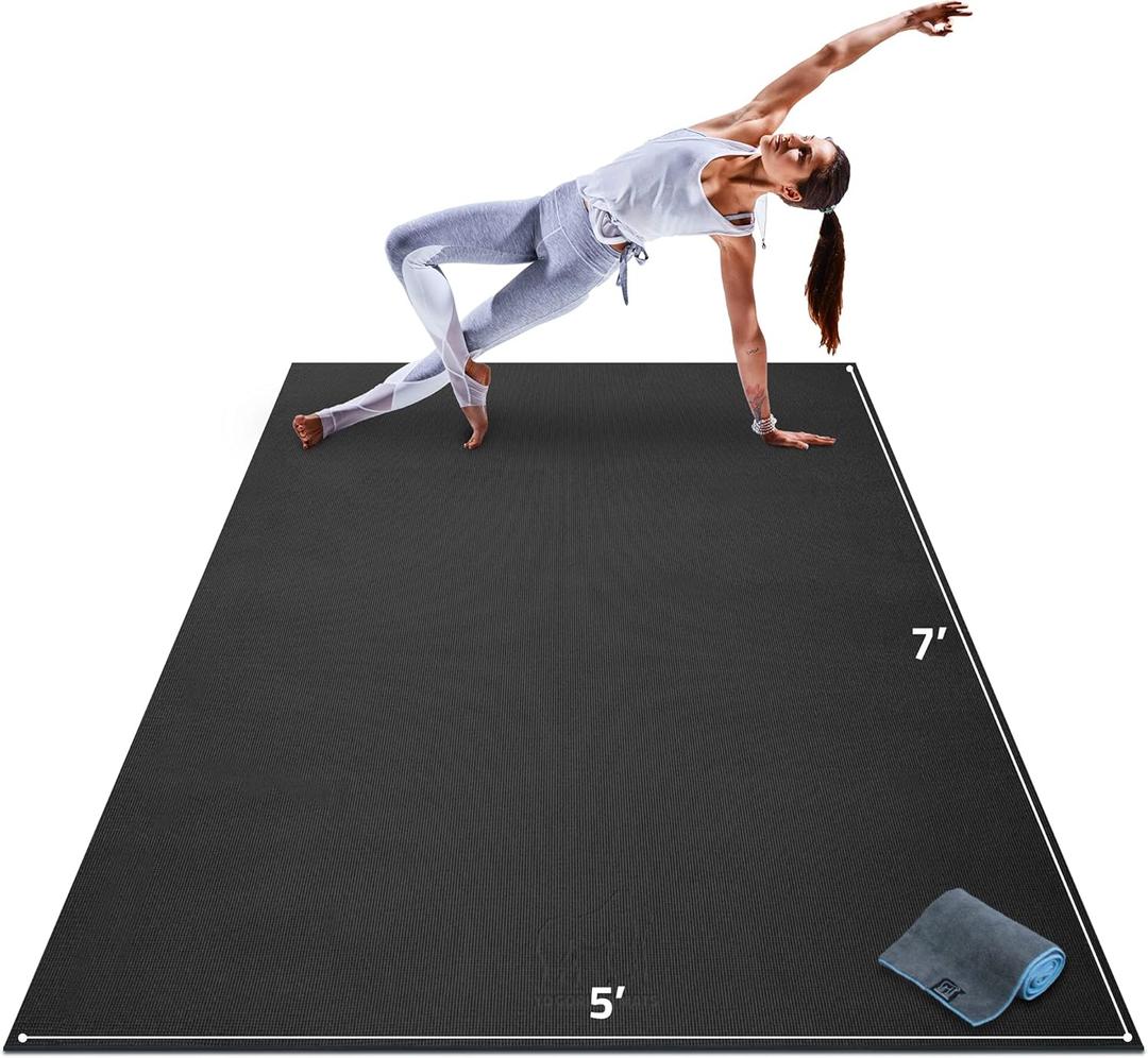 Gorilla Mats Premium Large Yoga Mat  7' x 5' x 8mm Extra Thick & Ultra Comfortable, Non-Slip Barefoot Exercise Mat  Works Great on Any Floor for Stretching, Cardio or Home Workouts (Onyx Black Mat with Gray / Blue Towel, 2 Storage Straps and Carry Bag)