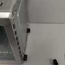 NutriChef 26L Electric Air Fryer Oven | 1700W Countertop Rotisserie & Air Fryer | 360° Rotating Feature | 10 Digital Menu Presets | Includes Drip Tray, Air Frying Basket & Bake Rack 15x16x14 (Silver)