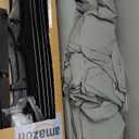 HOLDN STORAGE Portable Wardrobe Closet - 65 lb Large Capacity, Internal Heavy Duty Metal Rod, Zipper & Clear Window, Durable Clothes Organizer, Tool-Free Easy Assembly, Dark Gray Canvas Cover