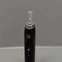 Oral-B iO Series 10 Rechargeable Electric Toothbrush with Visible Pressure Sensor to Protect Gums, 2 Min Timer, 7 Cleaning Settings, 4 Replacement Toothbrush Heads, and Charging Travel Case, Black