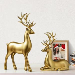 2PCS Gold Deer Statues Christmas Decor  Resin Standing & Sitting Reindeer Figurines, Holiday Tabletop Ornaments for Home Living Room, Fireplace, Shelf, or Xmas Gift Decoration (Gold)