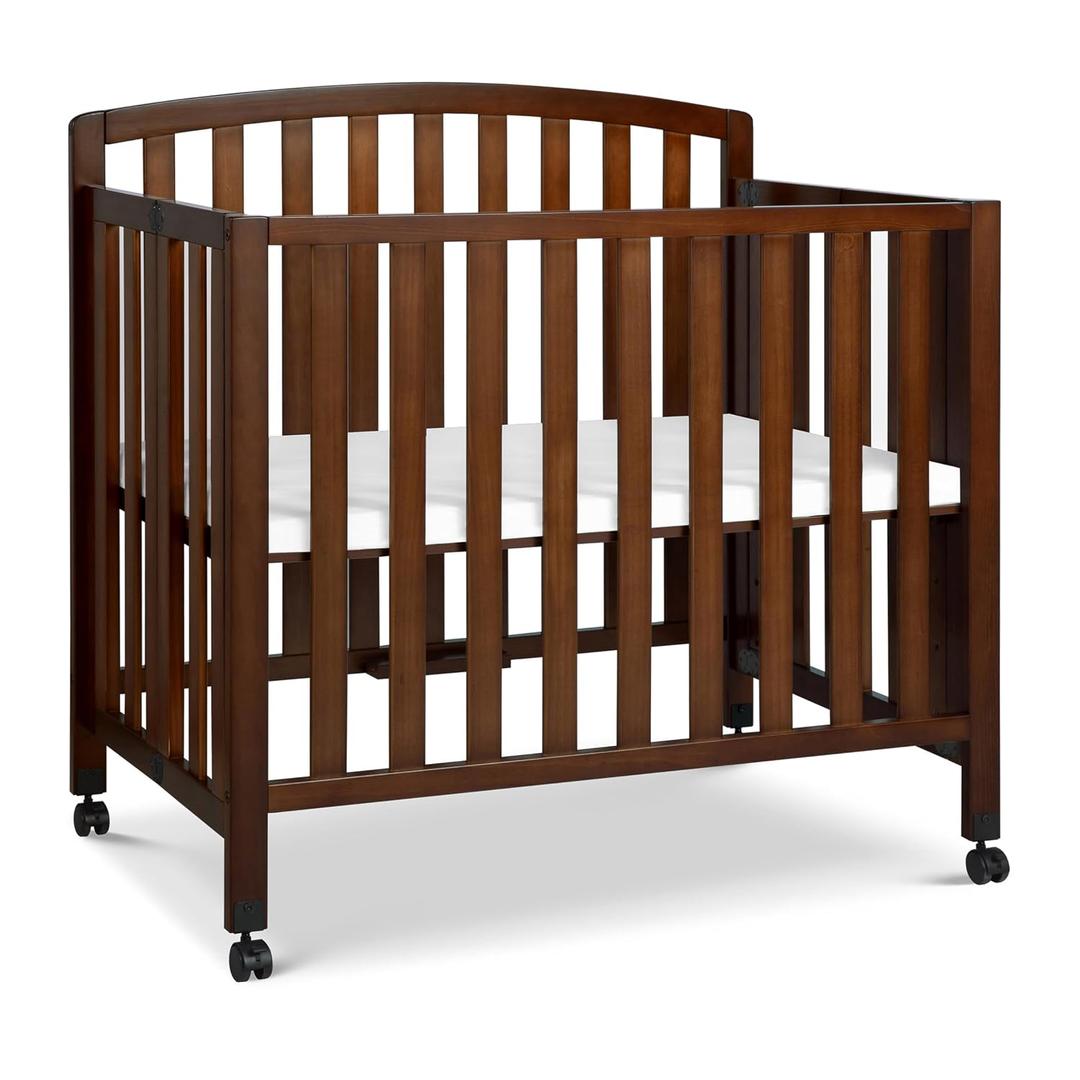 DaVinci Dylan 3-in-1 Convertible Portable Mini Crib, Espresso
GREENGUARD Gold Certified - Folding Baby Crib With Wheels, 4 Adjustable Mattress Heights, Conversion Kit Sold Separately