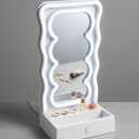 Orbit Wavy LED Light and Mirror Phone Holder is a multifunctional phone stand featuring a vibrant LED glow, a built-in mirror, and a trendy wave design for hands-free viewing