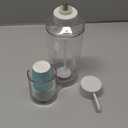 mDesign Plastic Refillable Mouthwash Dispenser and Cup Storage Organizer for Bathroom Vanity, Countertop, Cupboard  Includes 8 Paper Cups  Lumiere Collection  Clear/Matte White