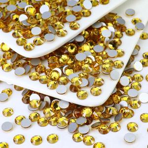 1440PCS SS10 Crystal Glass Flatback Rhinestones, Round Flat Back Crystal Gems for Nail Art and Craft Clothes, Glue Fix Diamond Stones Topaz Gold (2.7-2.8mm)