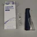 Waterpik Cordless Pulse 3100 Rechargeable Portable Water Flosser for Teeth, Gums, Braces Care and Travel with 2 Flossing Tips, Waterproof for Shower Use, ADA Accepted, WF-20 Blue