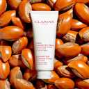 Clarins Hand and Nail Treatment Cream | Award-Winning | Softens, Nourishes and Shields Skin | Strengthens Nails and Conditions Cuticles | Natural Plant Extracts, Including Shea Butter