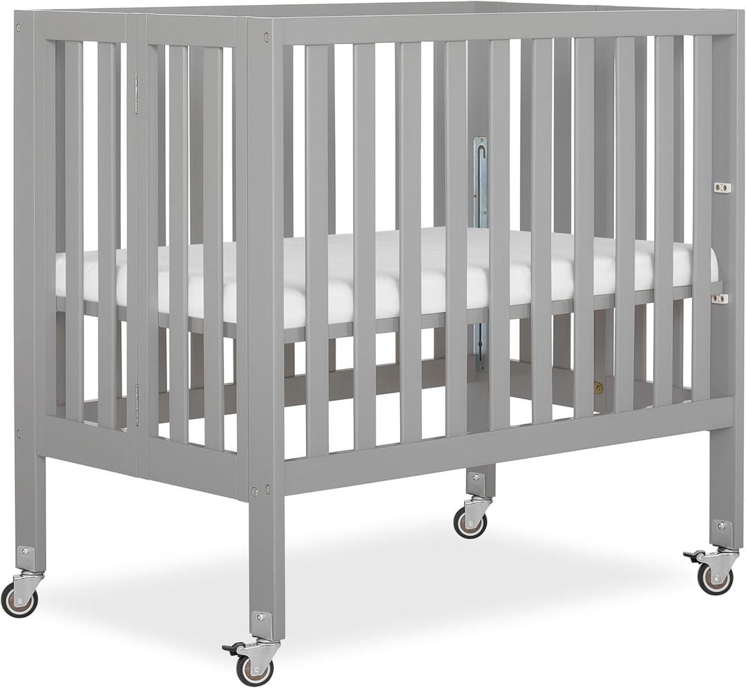 Dream On Me Jett Mini Folding Baby Crib in Pebble Grey, GreenGuard Gold & BSA, Lightweight & Portable, Patented Flat Folding System, Small Spaces & Travel, 1.5 Mattress Pad, 3 Heights, Safe Wheels