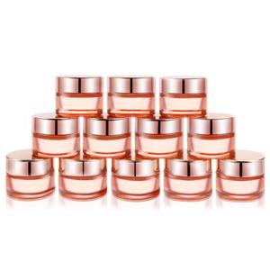Cositina 12 Pack 1oz Pink Glass Jars,Empty Round Storage Travel Containers with Rose-Golden Lids & Inner Liners,Refillable Cosmetic Vials for Moisturizer,Creams,Salve, Lotion