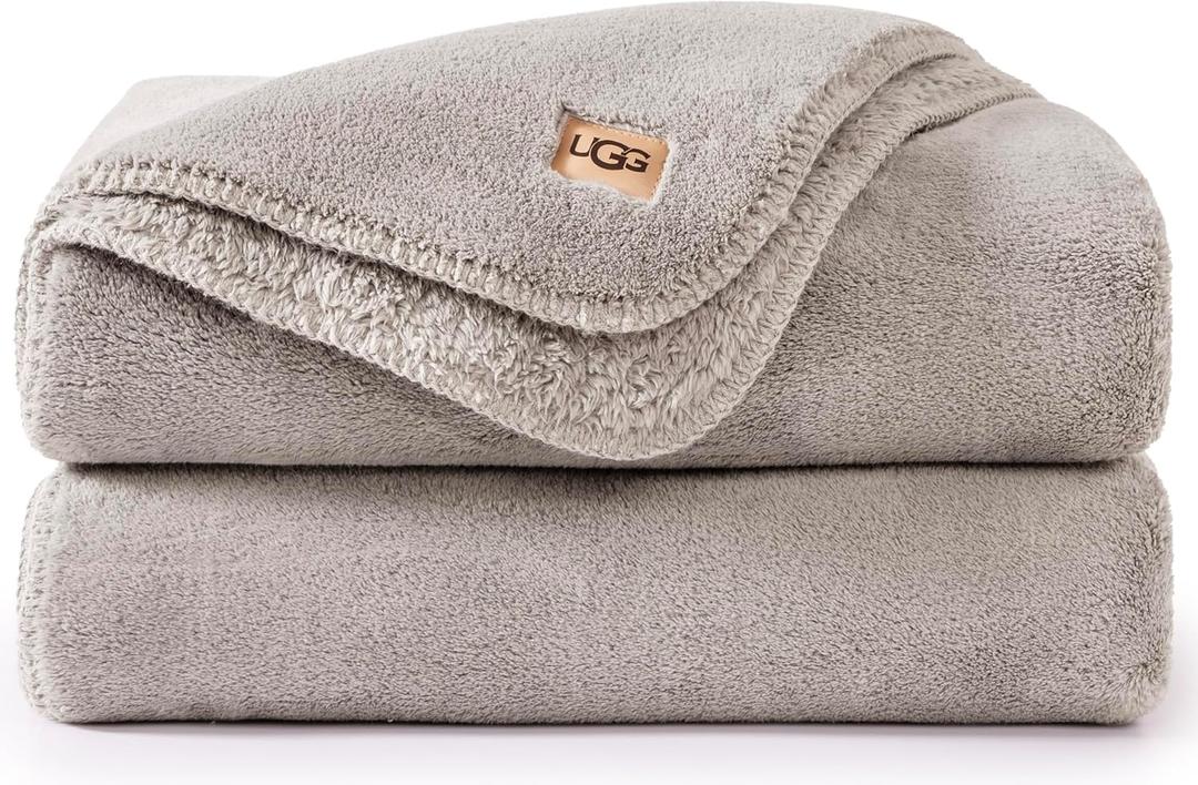 UGG Whitecap Plush Throw Blanket Fleece Lightweight Soft Throw for Couch or Bed Luxury Home Decor for Living Room Washable Hypoallergenic Blankets for Dorm Decor, 50-inch x 70-inch, Light Grey Seal (Silver)