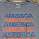 DOE Men’s Graphic T-Shirt "AMERICA" Print – Patriotic Red & Blue Stars Design – 50% Cotton, 50% Polyester – Size 2XDOE 50% Cotton 50% Polyester Size 2x