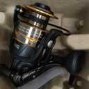 Penn Battle IV Size 4000 Spinning Fishing Reel, Full Metal Body and Sideplate, CNC Gear Technology, Hydro Armor Seals Critical Area from Water Intrusion, HT-100 Drag System