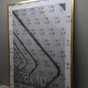 Americanflat 28x40 Poster Frame with Polished Plexiglass - Use as 24x36 Frame with Mat or Display 28x40 Photo Without Mat - Streamline Collection - Thin Border Picture Frames for Wall - Gold