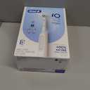 Oral-B Rechargeable Electric Toothbrush, iO3 Limited Deep Clean, 3 Cleaning Modes, Visual Pressure Sensor to Protect Gums, 2 Brush Heads, Travel Case, White