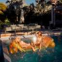 FUNBOY Giant Inflatable Luxury Clear Rainbow Dual Chaise Lounger Pool Float, Transparent Pink, Orange and Yellow Material, Perfect for a Summer Pool Party