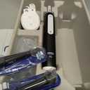 Oral-B iO Deep Clean Rechargeable Electric Toothbrush, Black, iO Series 3 Limited, 2 Brush Heads, Travel Case, Pressure Sensor, 3 Cleaning Settings (1 Count (Pack of 1))