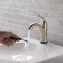 Delta Faucet Lahara Single Hole Bathroom Faucet with Touchless Technology, Brushed Nickel Bathroom Sink Faucet, Single Handle Bathroom Faucet, Bath Faucet, Push Pop-Up Drain, Stainless 538T-SS-DST