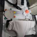 Ultimate 3-in-1 Baby Travel Set: Ultra-Portable Travel Bassinet, Activity Mat with Safety Harness, and Plush Developmental Toys (Mirror & Flower Rattle)